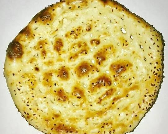 Naan with Sesame Seeds (Till) and Butter.